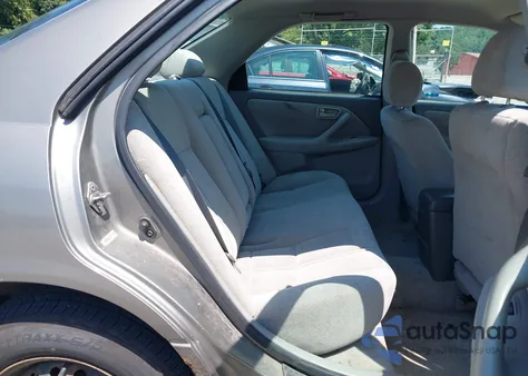 2001 Toyota Camry Le from USA, damaged, VIN 4T1BG22K71U045327